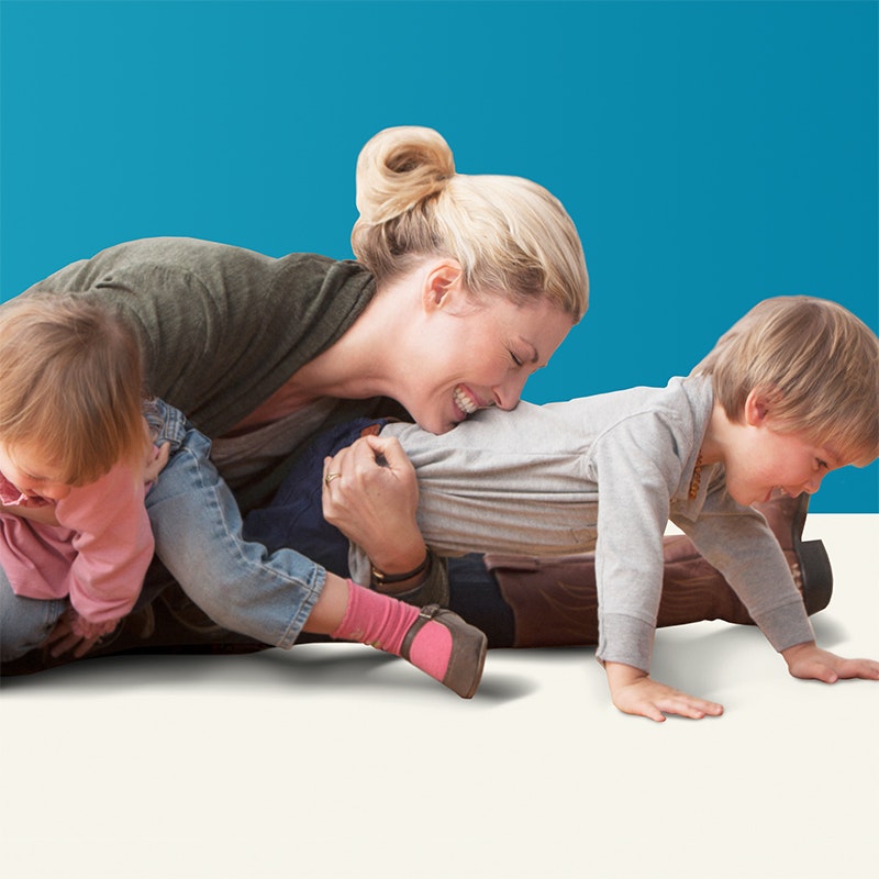 mother playing with children info tile for blog