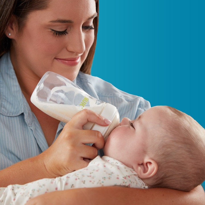 mother feeding baby