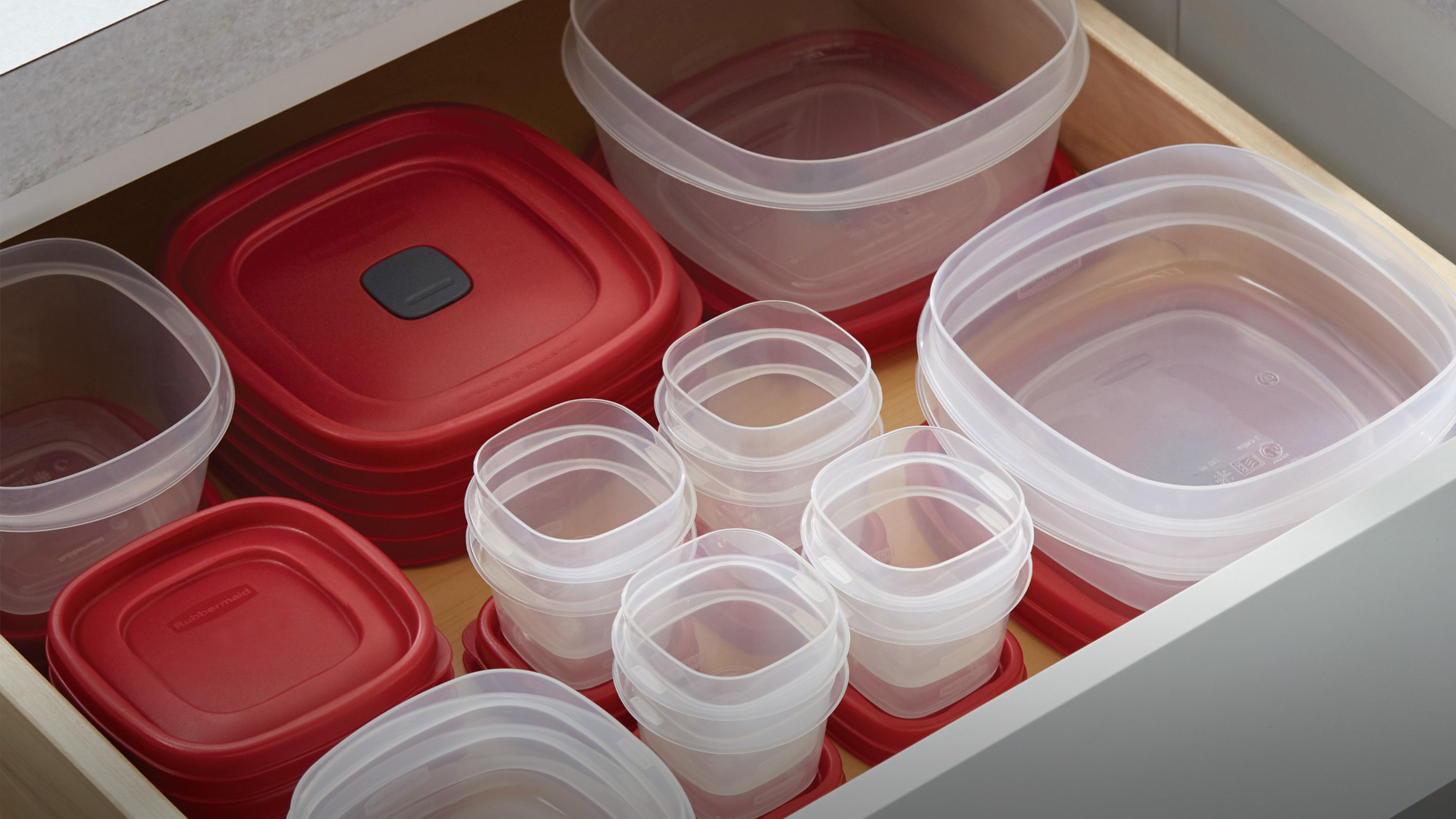 stacked and organized easy find lids containers in drawer