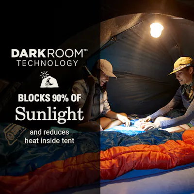 Two people inside tent with Darkroom technology